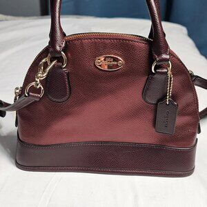 Coach Mini Cora domed satchel in metallic oxblood leather